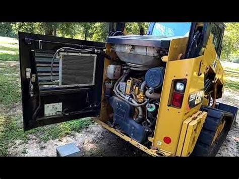 cat skid steer battery location|cat 259d skid steer battery.